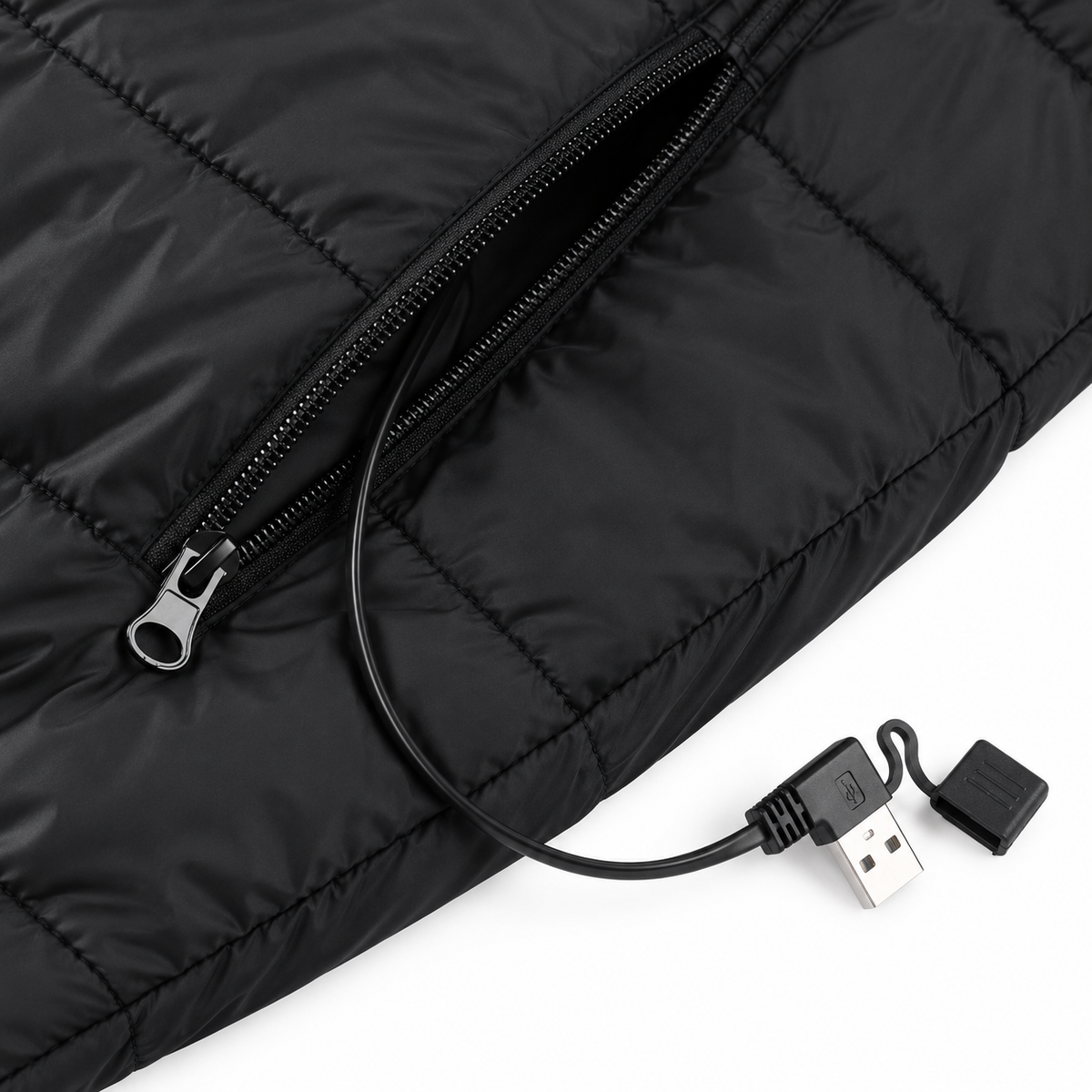 Zipped battery pocket and USB-A power cable inside the black 9-Zone Heated Gilet