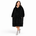 Black BardiHeat heated fleece worn in a playful studio pose with two pocket-closing buttons