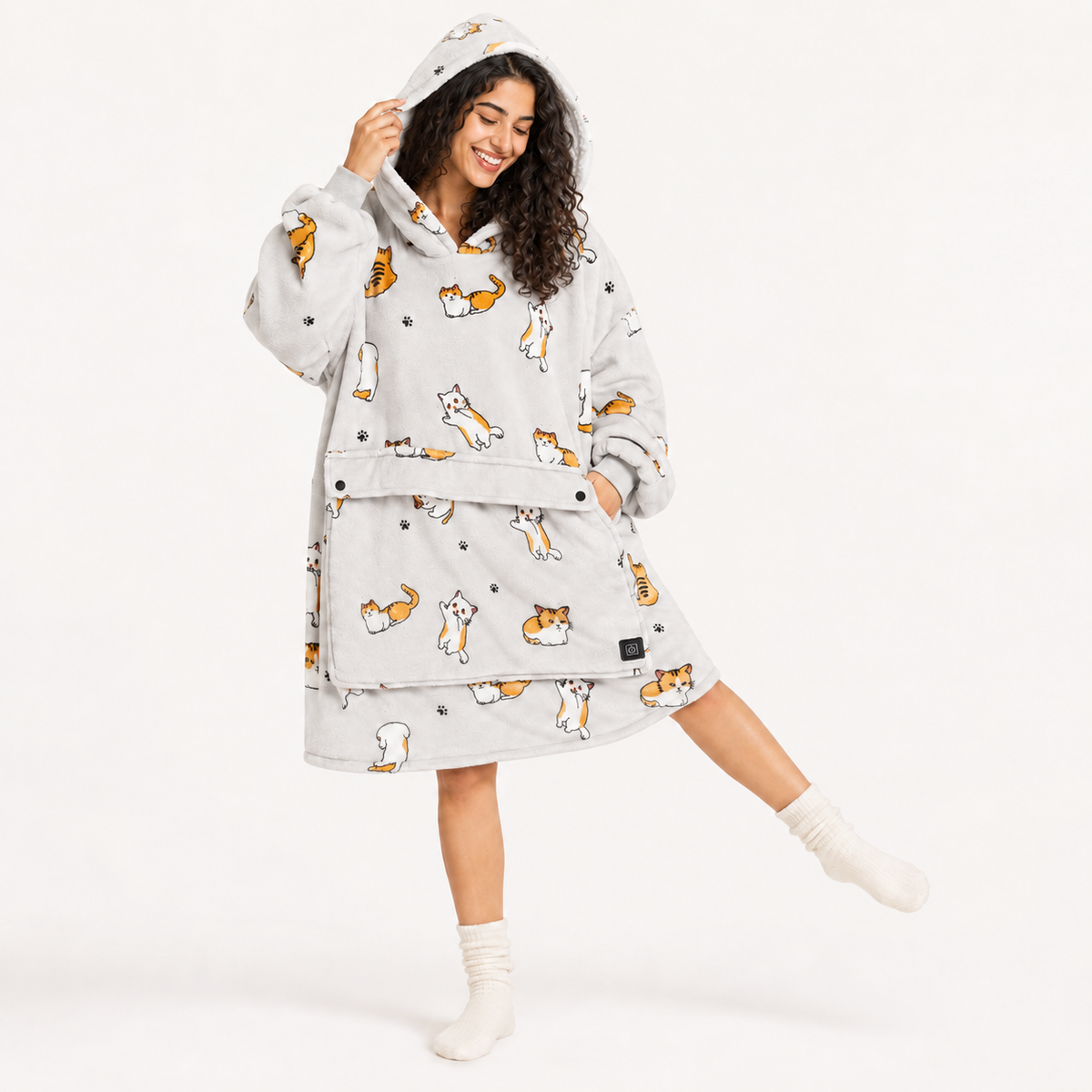 Cats BardiHeat heated fleece worn in a playful studio pose with two pocket-closing buttons