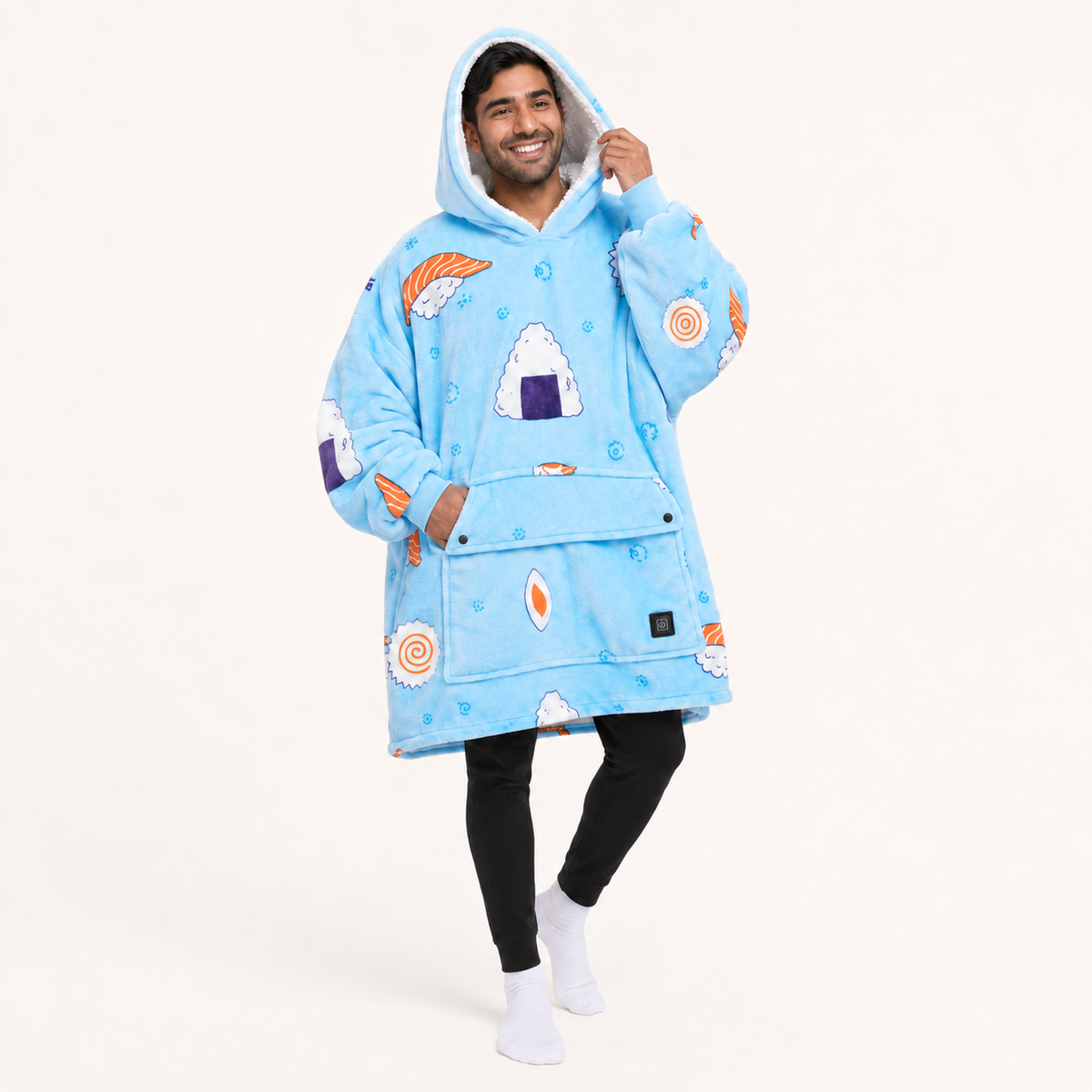 Sushi BardiHeat heated fleece worn in a playful studio pose with two pocket-closing buttons