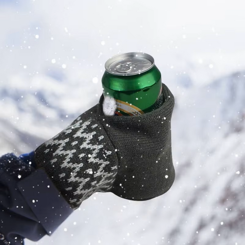 BrewMitt holding a can outdoors in snowy weather