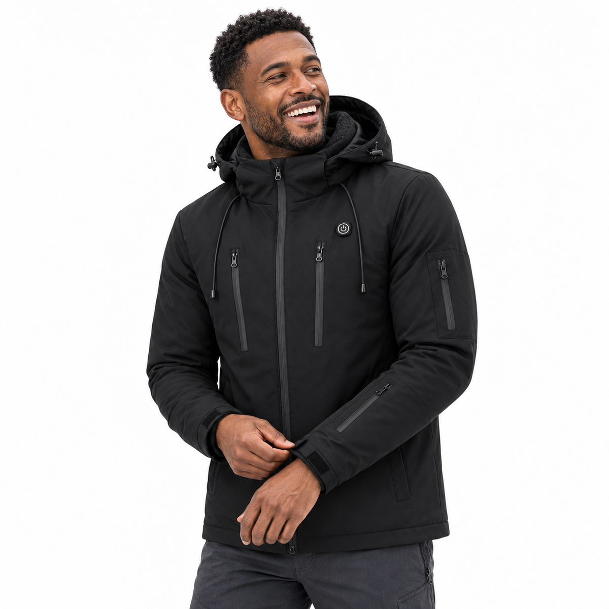 Model enjoying the black Fleece-Lined Heated Puffer Jacket in a white studio
