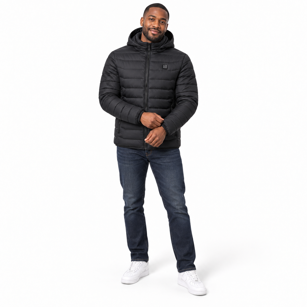 Model wearing the black Heated Outdoor Jacket in a white studio