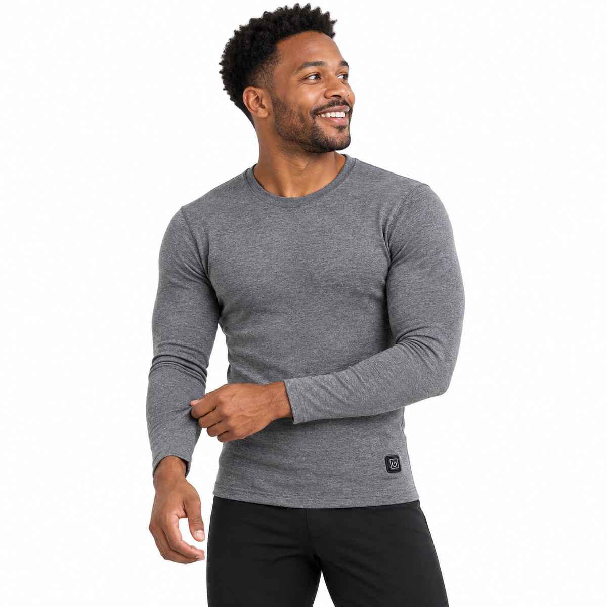 Model wearing men's grey Heated Thermal Top in a white studio